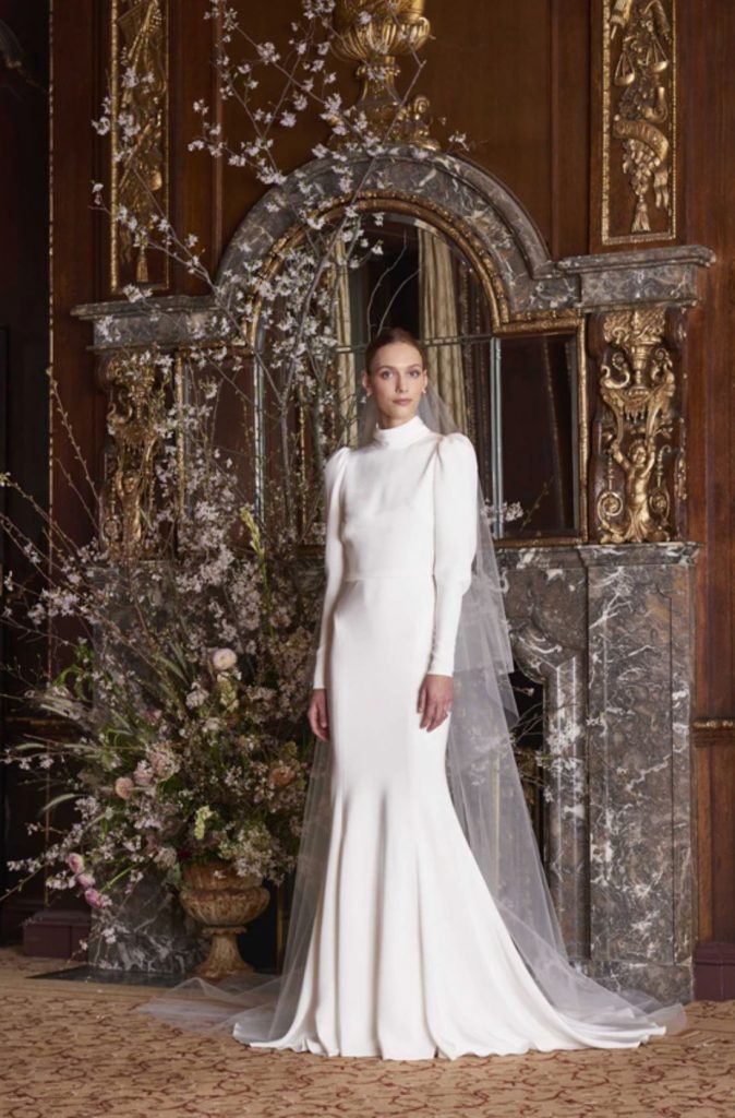 80s puffed shoulder wedding dress with long sleeves and fitted bodice and full coverage, perfect for a cold winter wedding